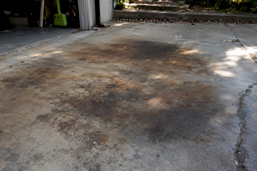 Stained concrete driveway surface close-up