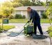 Technician using water reclamation pressure washer