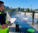 Property manager overseeing parking structure cleaning