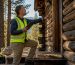 Inspector examining exterior home siding