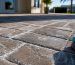 White efflorescence deposits across patio pavers